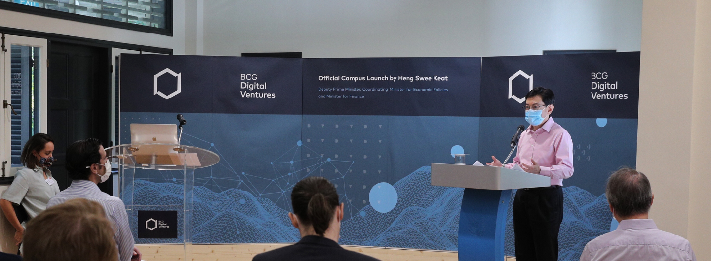 Heng Swee Keat speaking at BCG Digital Ventures event, audience present.